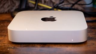 Apple Mac Mini on wood desk