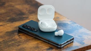 Samsung Galaxy Buds 2 Pro case open on top of Galaxy Z Fold 4