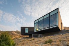 Dramatic exterior view showing the angles of Wabi Sabi house