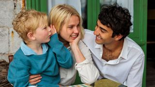 Marianne Ihlen (Thea Sofie Loch Næss) and Leonard Cohen (Alex Wolff) laughing with Axel Joachim in So Long, Marianne