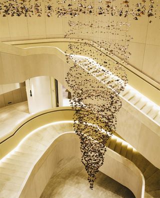 Staircase with hanging art piece Pagoda Mirage