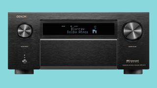 Denon AVR-A1H AV receiver on blue background