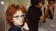 Nan in the bathroom with roommate, 1970s, from 'All the Beauty and the Bloodshed'