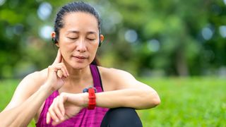 Woman checking her pulse