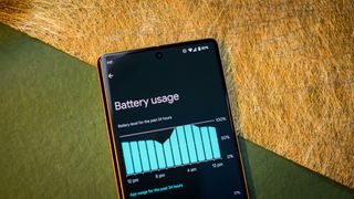 Google Pixel 7 Pro battery stats page on gold background