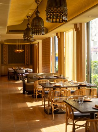 André Fu interiors of Leela Hong Kong restaurant, with light coming in from windows