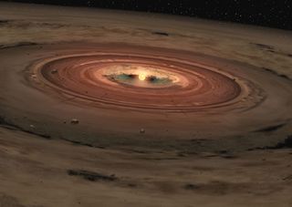 In this artist's conception, gas and dust swirl around a young star. Eventually this material should form planets through gravitational accretion.