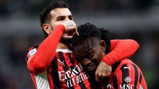 Theo Hernandez of Ac Milan (L) celebrates with his team mate Rafael Leao of Ac Milan (R) ahead of the AC Milan vs Liverpool live stream