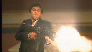 Al Pacino as tony montana in scarface firing assault rifle