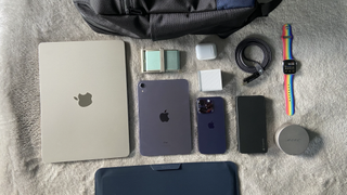 Travel bag and accessories flat lay