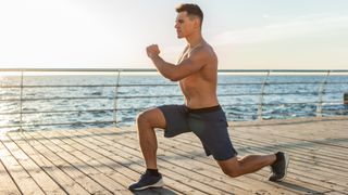 a photo of a man doing a reverse lunge