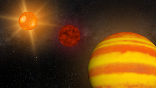 A striped orange sphere next to a smaller red sphere and a bright glowing orange sphere