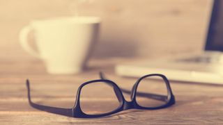 A pair of glasses on a table