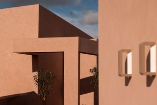 Domes Novos Santorini hotel sculptural exterior