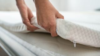 Putting back a mattress topper