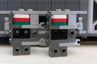 The white, red and green plates hidden inside the tail masts of the Lego Icons NASA Artemis Space Launch System are an "easter egg" reference to Lego's fictional gas station brand.