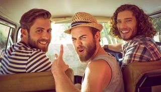 Three white hipster dudes in a van, ready to get lit.