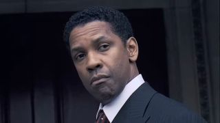 Frank Lucas (Denzel Washignton) staring down law enforcement in American Gangster