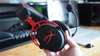 HyperX Cloud Alpha gaming headset in hand