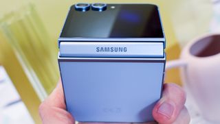 [Embargoed] a photograph of the Samsung Galaxy Z Flip 6 in Blue