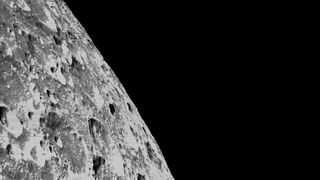 The crater-riddled far side of the moon, as seen by NASA's Orion spacecraft during the Artemis 1 mission in late 2022. China plans to launch a relay satellite in early 2024 to facilitate communications with spacecraft on the lunar far side.