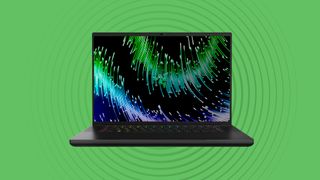 Razer Blade gaming laptop on green background