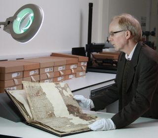 Mark Bateson, the Kent County Council Community History Officer, with the Magna Carta.