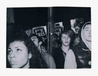 A black & white photo of people protesting.