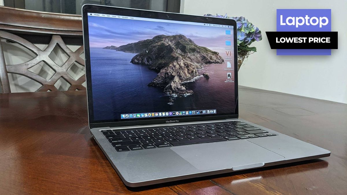 MacBook Pro laptop on a wooden table