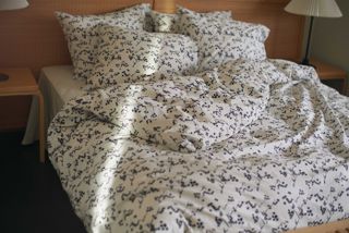 Aino Aalto inspired Tekla bedding with white flowers on pastel background