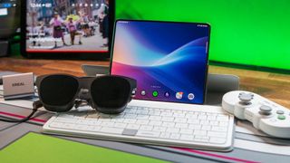 Desk setup with Xreal Air 2, Galaxy Z Fold 5, and Mokibo keyboard