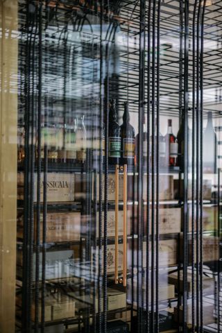 A room with a wine cellar