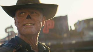 Image from the Fallout TV show. This is a close up of a man wearing a cowboy hat. His face has no skin.