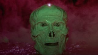 Frank Langella as Skeletor with head sticking out of water
