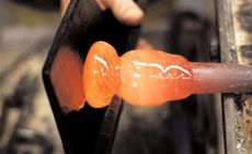 A close-up of an orange bottle. 