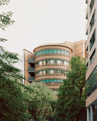 walking through Potsdamer Platz in Berlin and its postmodernist architecture, showing large scale buildings with transparencies and grids