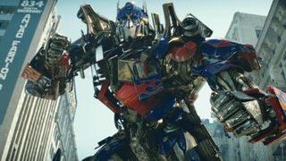 A screenshot of the movie Transformers that shows Optimus Prime in action