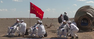 The three-person crew of Shenzhou 12 - Nie Haisheng, Liu Boming and Tang Hongbo - are seen after exiting their Shenzhou capsule after landing in n the Gobi Desert in Inner Mongolia on Sept. 17, 2021 to end a 90-day mission to China's Tianhe module, the first piece of the Tiangong space station.