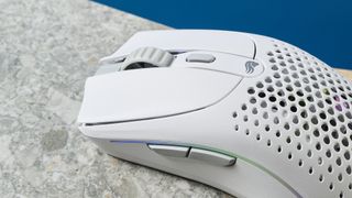 A white Glorious Model O 2 wireless gaming mouse