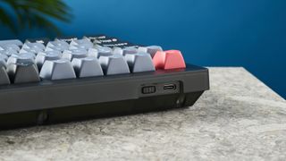 A Keychron V1 wired mechanical keyboard, in the frosted black (translucent) colorway