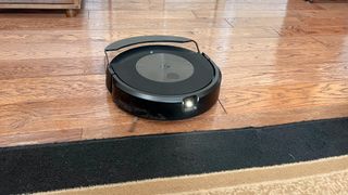 Roomba J9+ Combo robot vacuum and mop shown on floor