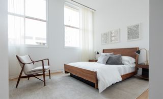 bedroom with art on the wall