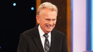 Pat Sajak laughing at Lauren Lapkus on Celebrity Wheel of Fortune