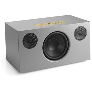 A grey Audio Pro C20 speaker on a white background.