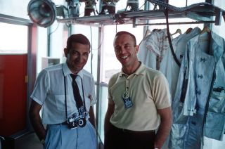 NASA photographer Bill Taub poses with astronaut Alan Shepard a month before Shepard's 1961 launch.