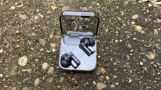 the nothing ear 1 earbuds in their charging case