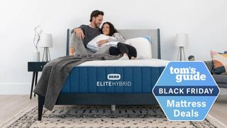 Image shows the Bear Elite Hybrid Mattress with a couple lying on top