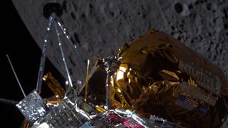 A private Intuitive Machines moon lander in lunar orbit with the moon&#039;s cratered surface below with black space in the background.