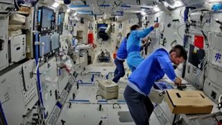 The astronauts of China's Shenzhou 18 mission aboard the Tiangong space station prep for an upcoming spacewalk.