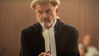 Sam Neill as Brett Colby QC in a courtroom setting in &quot;The Twelve&quot;